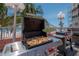 Outdoor kitchen with professional grill, great amenities, and ocean views at 18400 Gulf Blvd # 2505, Indian Shores, FL 33785