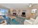 Open-concept living room with a fireplace and view of the ocean at 18400 Gulf Blvd # 2505, Indian Shores, FL 33785