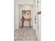 Inviting foyer with neutral tile flooring and stylish decor, creating a welcoming entrance to the home at 2120 S Hesperides St, Tampa, FL 33629