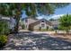 Charming home with mature landscaping and a circular driveway at 2120 S Hesperides St, Tampa, FL 33629