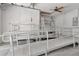 Clean and functional garage space featuring a ramp, utility connections, and ample room for storage at 2120 S Hesperides St, Tampa, FL 33629