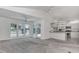 Bright and airy living area with access to the pool, with a combined kitchen area at 2120 S Hesperides St, Tampa, FL 33629