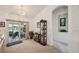 Dining room next to sliding glass doors with views of the water and outdoor seating at 2218 Brookfield Greens Cir # 82, Sun City Center, FL 33573