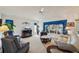 Living room with plush seating, large windows, and decorative touches throughout at 2218 Brookfield Greens Cir # 82, Sun City Center, FL 33573