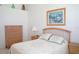 Cozy bedroom with light wood furniture and decor at 2325 Brookfield Greens Cir # 41, Sun City Center, FL 33573