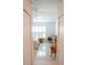 Bright bedroom with white walls, tiled floors, and closet at 2325 Brookfield Greens Cir # 41, Sun City Center, FL 33573