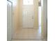 Tiled foyer with front door, interior door and closet at 2325 Brookfield Greens Cir # 41, Sun City Center, FL 33573