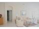 Bright and airy living room with neutral palette and tiled floors at 2325 Brookfield Greens Cir # 41, Sun City Center, FL 33573