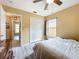 Comfortable bedroom with wood-look floors, natural light and plenty of space at 2601 Brookville Dr, Valrico, FL 33596