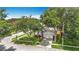 Charming single-Gathering home with a manicured lawn, mature trees, and a two-car garage at 2601 Brookville Dr, Valrico, FL 33596
