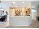 Open floor plan showcasing the kitchen, dining area, and doorway at 2601 Brookville Dr, Valrico, FL 33596
