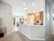 Bright kitchen and dining area boasts an open design with tile flooring at 2601 Brookville Dr, Valrico, FL 33596