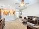 Spacious living room offers ample seating, tile floors, and an open layout to the kitchen at 2601 Brookville Dr, Valrico, FL 33596