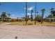 Inviting coastal home featuring a spacious front yard, lush landscaping, and a serene neighborhood setting at 3111 S De Bazan Ave, St Pete Beach, FL 33706