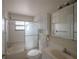 Bathroom featuring a shower-tub, vanity, and medicine cabinet at 3256 Adrian Ave, Largo, FL 33774