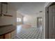 Open-concept living space includes a view of the kitchen and access to other rooms at 3256 Adrian Ave, Largo, FL 33774
