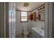 A view of the bathroom with modern vanity, standard toilet, and medicine cabinet at 3258 Adrian Ave, Largo, FL 33774