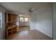 An empty bedroom features an open doorway and hardwood flooring in the sunroom at 3258 Adrian Ave, Largo, FL 33774