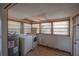 A view of the laundry room featuring a washer and dryer, plus natural light at 3258 Adrian Ave, Largo, FL 33774
