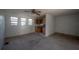An open floorplan showing the living room connected to the kitchen with natural light at 3258 Adrian Ave, Largo, FL 33774