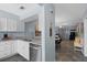 Seamless connection from kitchen to living area, enhancing the flow and functionality of the home at 340 Causeway Blvd # 104, Dunedin, FL 34698
