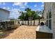 A brick patio is designed for outdoor activities, with an outdoor kitchen and a dining area at 3405 W Palmira Ave, Tampa, FL 33629