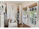Spacious closet with built-in shelving and a view of the backyard from the double doors at 3405 W Palmira Ave, Tampa, FL 33629