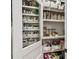 Walk-in pantry with custom shelving and storage solutions, offering ample space for organization at 3405 W Palmira Ave, Tampa, FL 33629