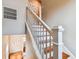 Elegant staircase with wood treads and white risers and railings at 3405 W Palmira Ave, Tampa, FL 33629