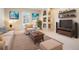 Cozy living room with neutral tones, stylish decor, and comfortable seating, perfect for relaxing and entertaining guests at 3656 Kalanchoe Pl, Wesley Chapel, FL 33544