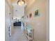 Welcoming foyer with tile flooring, high ceilings, and neutral décor leading into the home at 3834 102Nd N Pl, Clearwater, FL 33762