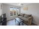 Comfortable living room features a couch, modern tv, and bright natural lighting at 3834 102Nd N Pl, Clearwater, FL 33762