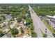 Aerial of home and surrounding neighborhood near main thoroughfare at 3968 Orchard Hill Cir, Palm Harbor, FL 34684
