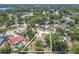 Aerial view of the neighborhood showcasing a private backyard with pool at 3968 Orchard Hill Cir, Palm Harbor, FL 34684