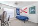 Bedroom with twin bed, ceiling fan and carpet at 3968 Orchard Hill Cir, Palm Harbor, FL 34684