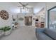 Bright and airy living room featuring high ceilings, neutral walls, and open layout at 3968 Orchard Hill Cir, Palm Harbor, FL 34684
