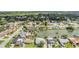 Aerial view of a waterfront community with well-maintained homes and landscaping at 4041 Star Island Dr, Holiday, FL 34691