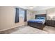 Bedroom showcasing a dark wood bed frame, plush rug and a bright window at 4041 Star Island Dr, Holiday, FL 34691