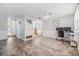 Open living space with updated floors, white trim and modern lighting at 4041 Star Island Dr, Holiday, FL 34691