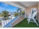 Balcony features astroturf, chairs and lovely water views at 405 8Th N Ave, Tierra Verde, FL 33715