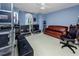 Cozy bedroom with blue walls, ample storage cases, a ceiling fan, and lots of space at 405 8Th N Ave, Tierra Verde, FL 33715
