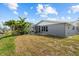 This picturesque backyard provides serene outdoor living with a boat dock and waterfront views, perfect for relaxing at 4210 Palm Dr, Punta Gorda, FL 33950
