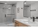 Tastefully renovated bathroom with glass shower, new vanity, undermount sink and modern fixtures at 4210 Palm Dr, Punta Gorda, FL 33950