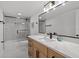 Modern bathroom featuring a tub, glass shower, and vanity with undermount sink at 4210 Palm Dr, Punta Gorda, FL 33950