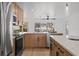 Beautifully updated kitchen featuring stainless steel appliances, wood cabinets and eat in area with lots of natural light at 4210 Palm Dr, Punta Gorda, FL 33950