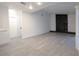 Spacious living room featuring a fireplace, modern flooring, and ample natural light at 4260 Saint Lawrence Dr, New Port Richey, FL 34655