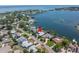 Aerial view showcasing the home's prime waterfront location near the bay with available dock and lift at 4649 Neptune Se Dr, St Petersburg, FL 33705