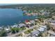 The aerial view showcases the home's position on the water, featuring a dock and boating opportunities at 4649 Neptune Se Dr, St Petersburg, FL 33705
