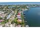 Aerial shot of the waterfront property, highlighting backyard access to the water and private boat dock at 4649 Neptune Se Dr, St Petersburg, FL 33705