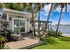 Charming outdoor area featuring a cozy waterside shed with beautiful surroundings at 4649 Neptune Se Dr, St Petersburg, FL 33705